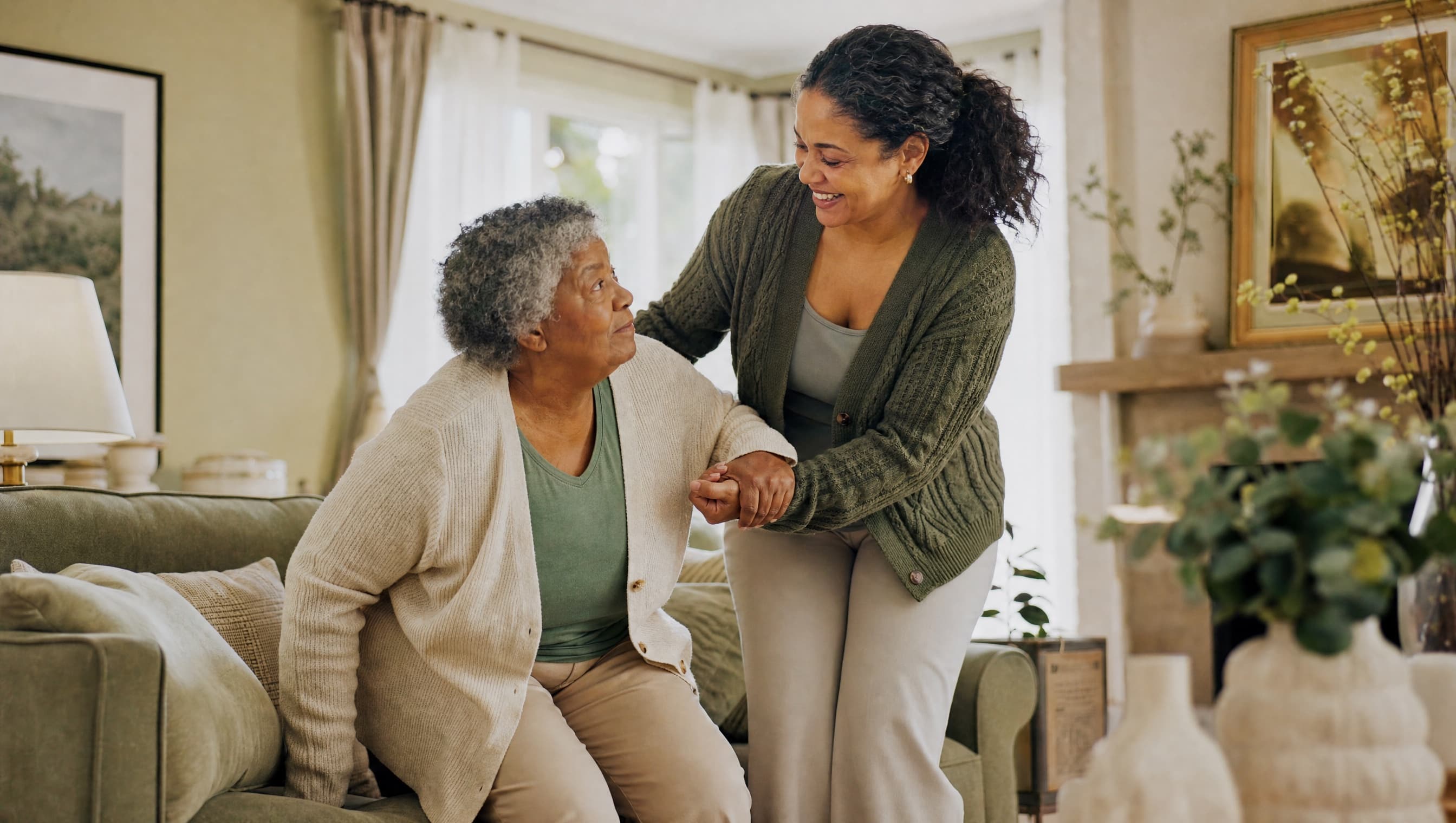 Caregiver helping an elderly family member at home in Michigan